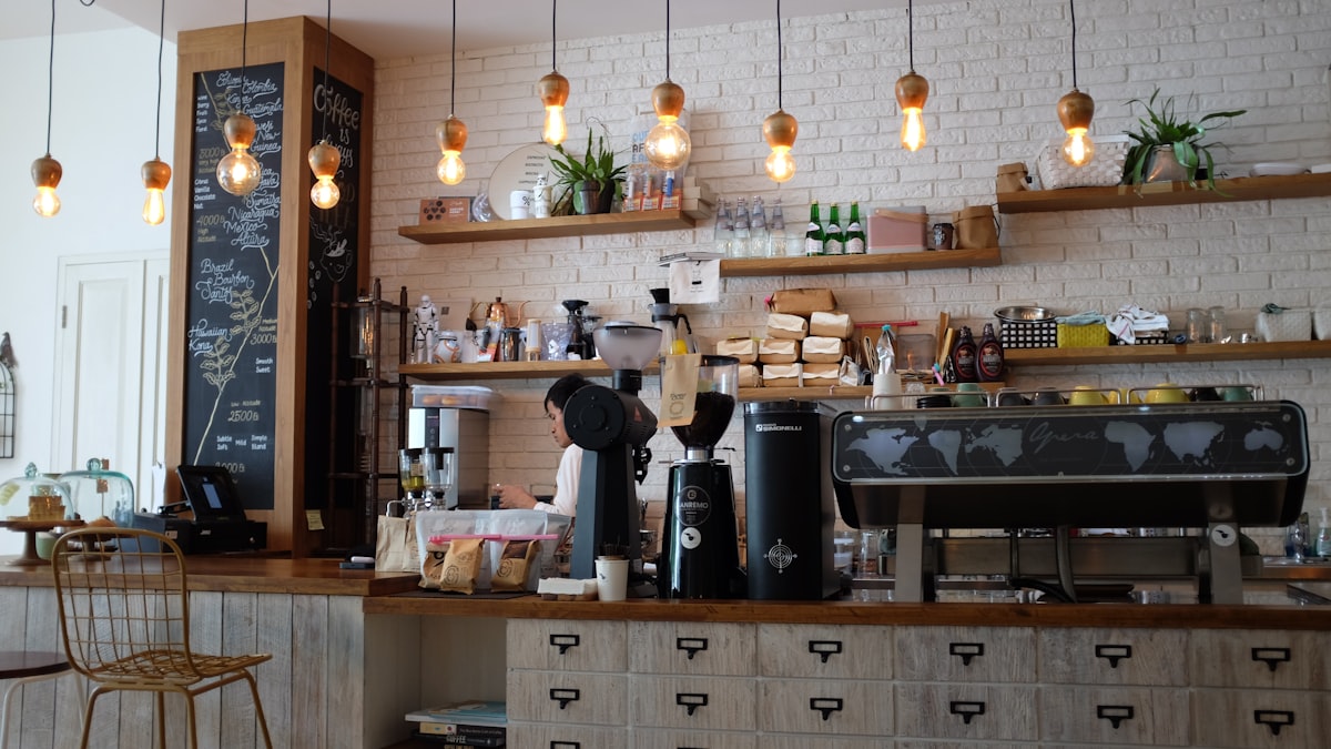 De'Longhi bean to cup coffee machine brewing espresso in a bright kitchen