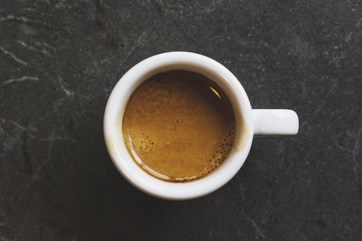 Chemex pour-over coffee brewer with a glass carafe and freshly brewed coffee